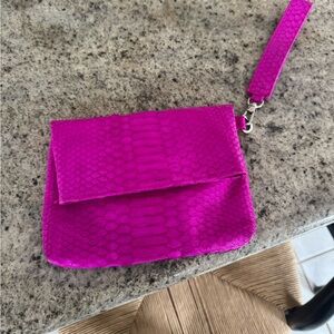 Python hot pink wristlet clutch